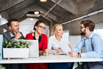 Wall Mural - Business meeting, creative people discussing at modern office