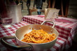 Delicious plate of pasta with amatriciana sauce, in Trastevere, Rome