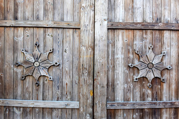 Fragment of closed wooden gate