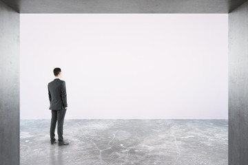 Wall Mural - man looking at empty billboard