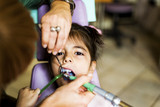 Fototapeta Na ścianę - Little girl at the dentist