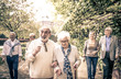 © oneinchpunch - Group of old people walking outdoor
