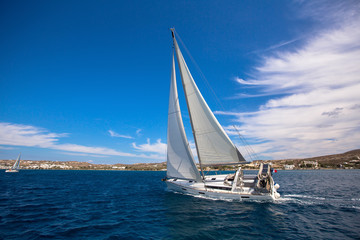 Wall Mural - Sailing in the wind through the waves at the Sea. Luxury yacht at race.