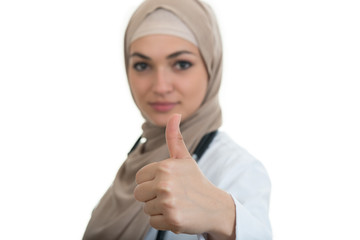 Wall Mural - Closeup portrait of friendly, smiling confident Muslim female doctor celebrating success