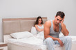 © Elnur - Family conflict with wife and husband in bed
