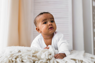 Portrait of a mixed race baby boy