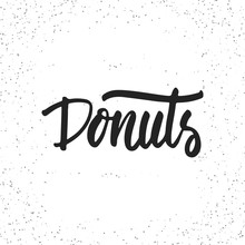 Donuts - Hand Drawn Lettering Phrase Isolated On The White Grunge Background. Fun Brush Ink Inscription For Photo Overlays, Greeting Card Or T-shirt Print, Poster Design