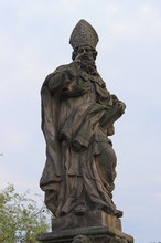 Statue Of St. Adalbert On The Charles Bridge In Prague, Czech Republic