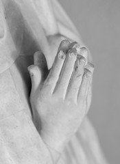 Wall Mural - Man hands praying ancient sculpture