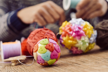 Sticker - man making handmade christmas balls