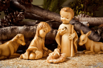 the holy family in a rustic nativity scene