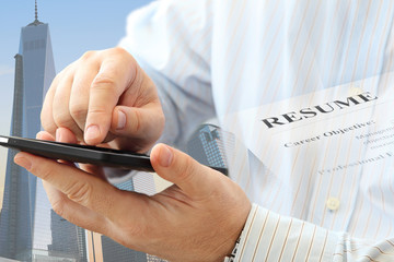 Poster - Close up of man using smartphone on urban background 