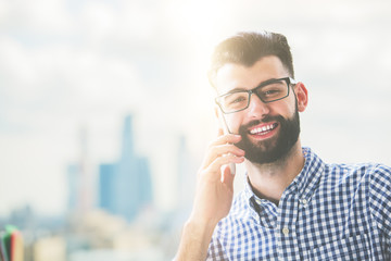 Wall Mural - Happy male on phone