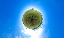 Little Planet - Spherical View Of Green Fields With Trees And Blue Sky
