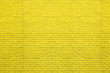 Yellow bricks pattern on wall for abstract background.