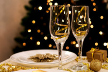 Two Glasses On New Year Decorated Table