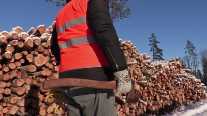 Poster - Lumberjack with rope and ax  near pile of logs