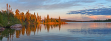 Rocky Island At Sunset On Lake In Finland.