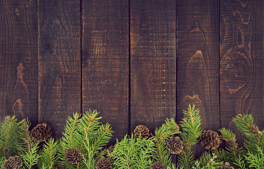 Wall Mural - Frame from decorated Christmas tree on rustic wooden background
