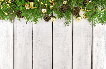 Wall Mural - Frame from decorated Christmas tree on white rustic wooden backg