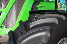 Tire On Green Tractor Close Up