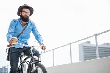 Poster - Hipster doing bicycle