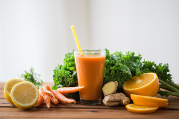 Wall Mural - glass of carrot juice, fruits and vegetables