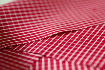 Wall Mural - close up texture fabric red with white line of shirt