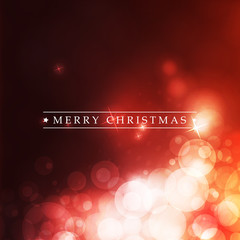 Colorful Happy Holidays, Merry Christmas Greeting Card With Label on a Sparkling Blurred Background 