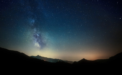 night sky stars with milky way on mountain background