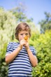© WavebreakmediaMicro - Portrait of cute boy looking a leaf with magnifying glasses