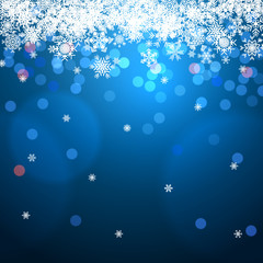 Canvas Print - winter background with bokeh and snowflakes