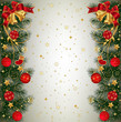 Christmas background with fir branch border with bells, ribbons and Christmas decorations. 