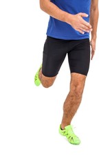 Wall Mural - Male athlete running on white background