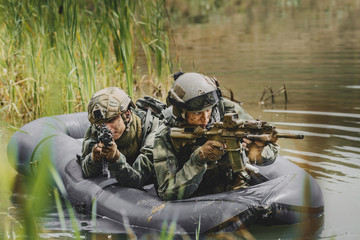 Wall Mural - rangers during the military operation in water..