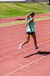 © WavebreakmediaMicro - Female athlete running on the racing track