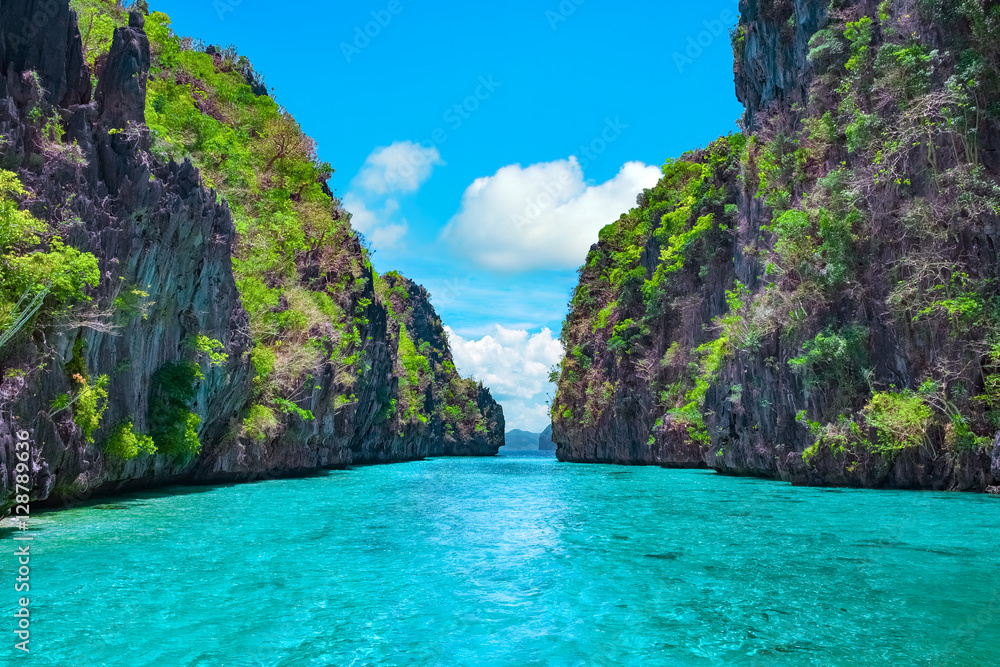 Beautiful tropical blue lagoon. Scenic landscape with sea bay and mountain islands, El Nido, Palawan, Philippines, Southeast Asia. Exotic scenery. Popular landmark, famous destination of Philippines - obrazy, fototapety, plakaty 