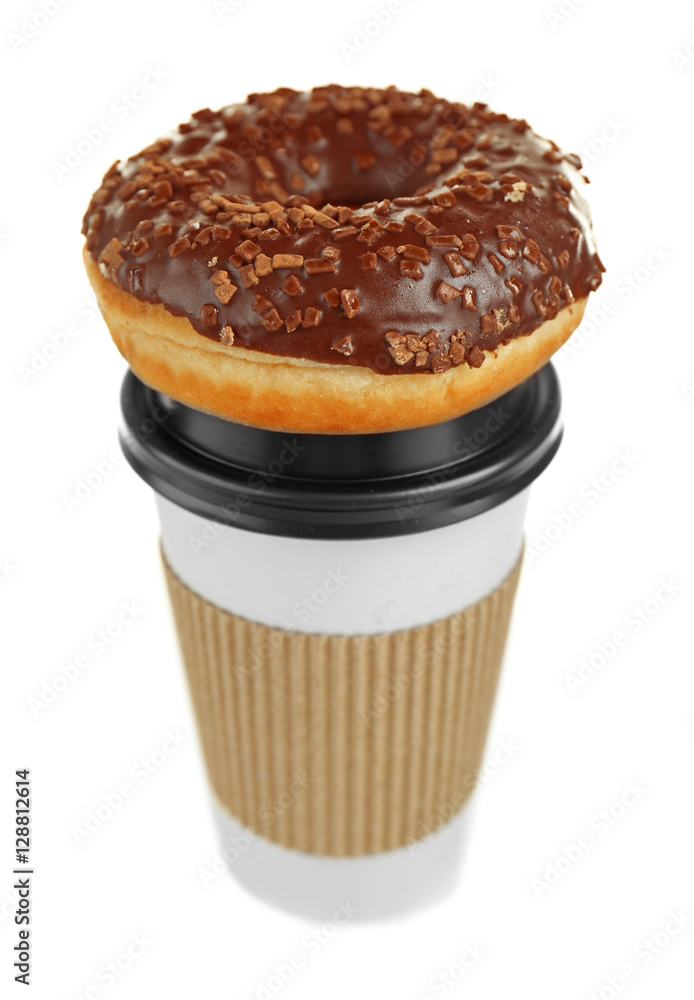 Cup of coffee with tasty donut on white background
