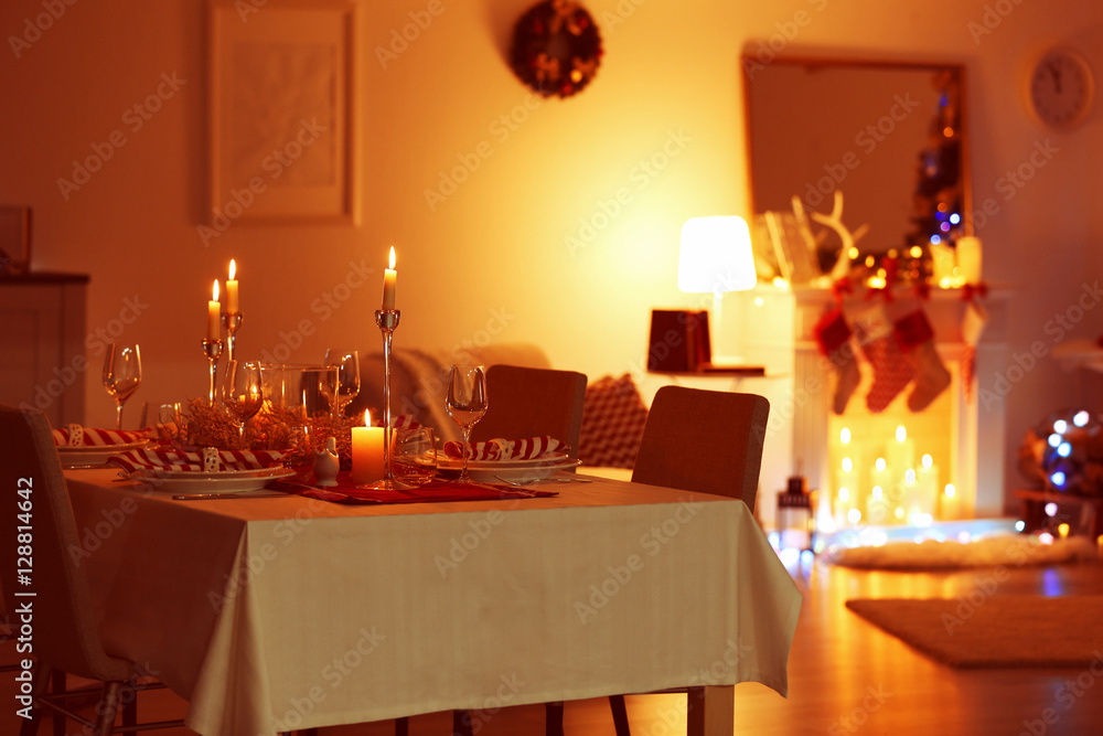 Table served for Christmas dinner in living room