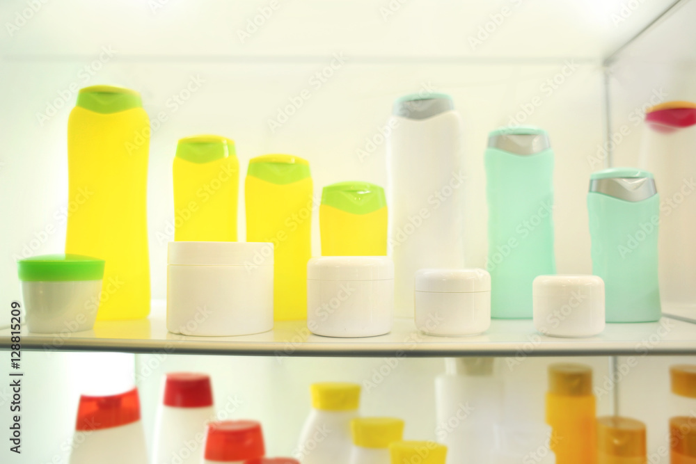 Stand with cosmetic products in retail shop