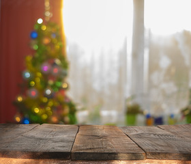 Wall Mural - christmas table background with christmas tree out of focus