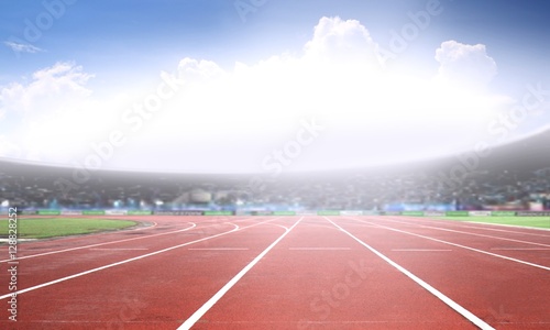 Fotografía Running track in a stadium under bright sunlight