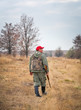 © es0lex - Hunter moving with shotgun looking for prey