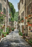 Fototapeta Na drzwi - Narrow old street with flowers in Italy
