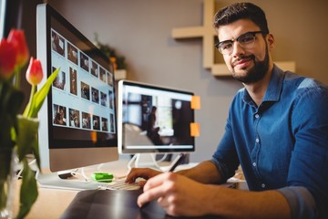 Graphic designer using a graphics tablet