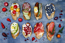 Mini Sandwiches Food Set. Brushetta Or Authentic Traditional Spanish Tapas For Lunch Table. Delicious Snack, Appetizer, Antipasti On Party Or Picnic Time. Top View.