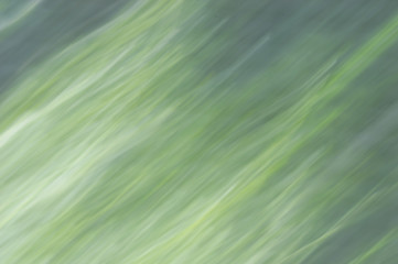 Blurred abstract background. Green purple and white.