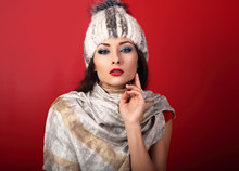 Beautiful Sexy Makeup Woman In White Fur Winter Hat And Fashion