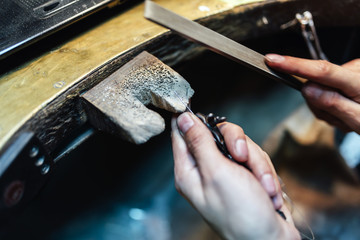 Jeweler working on a ring