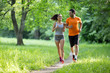 © NDABCREATIVITY - Healthy fit couple running in nature